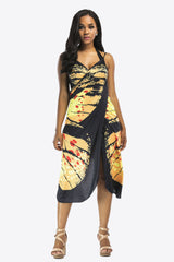 Close-up of butterfly print and spaghetti strap detail
