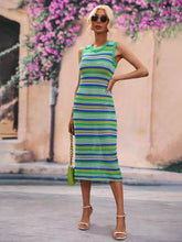 Woman wearing striped sleeveless midi cover-up dress outdoors