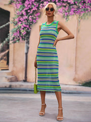 Woman wearing striped sleeveless midi cover-up dress outdoors