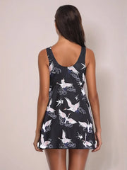 Back view of black printed slit one-piece swimwear