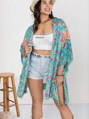Bold turquoise open front beach cover-up