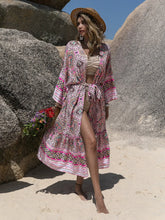 Pink printed cover-up with tie front view