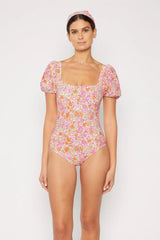 Pink floral one-piece swimsuit front view