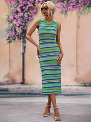 Midi length beach dress layered over swimsuit