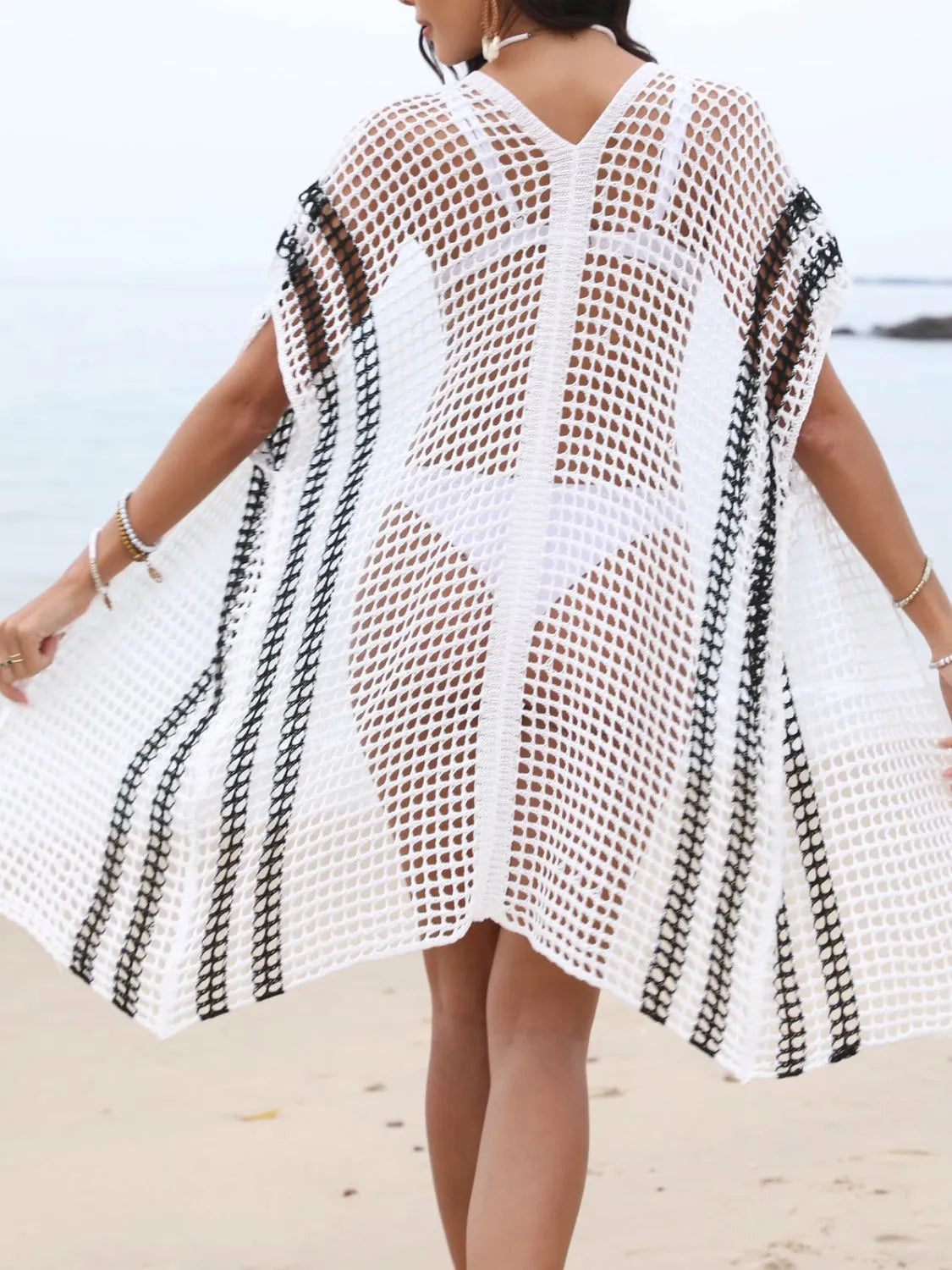 Rear view white openwork cover-up with edge detail