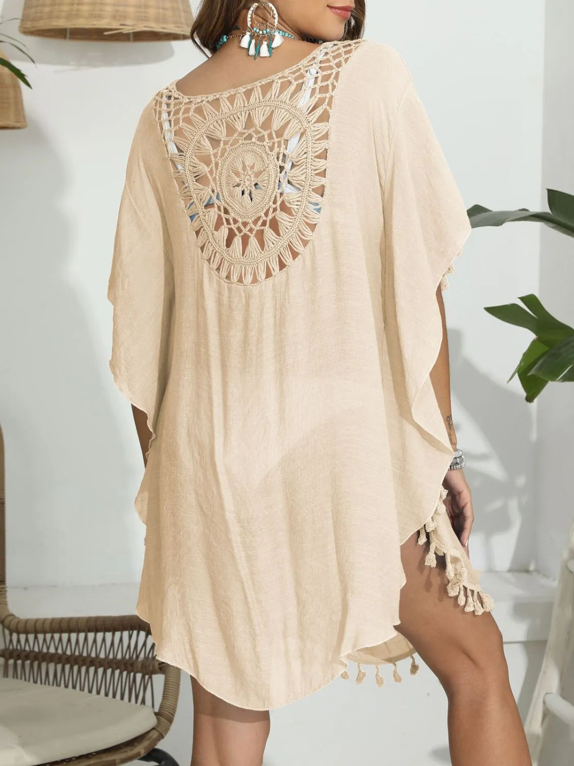 Back view of tan crochet cover-up