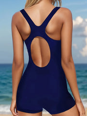 Navy swimsuit back view with crisscross cutout design