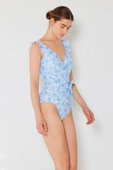Front view of faux wrap blue swimsuit