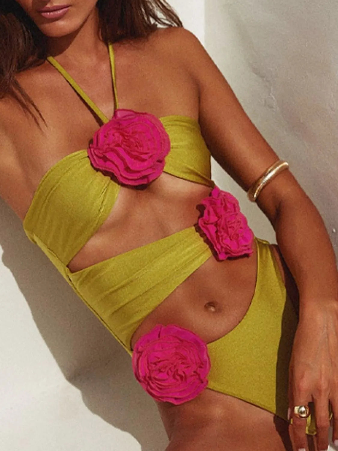 Yellow-green flower cutout halter one-piece swimsuit front view