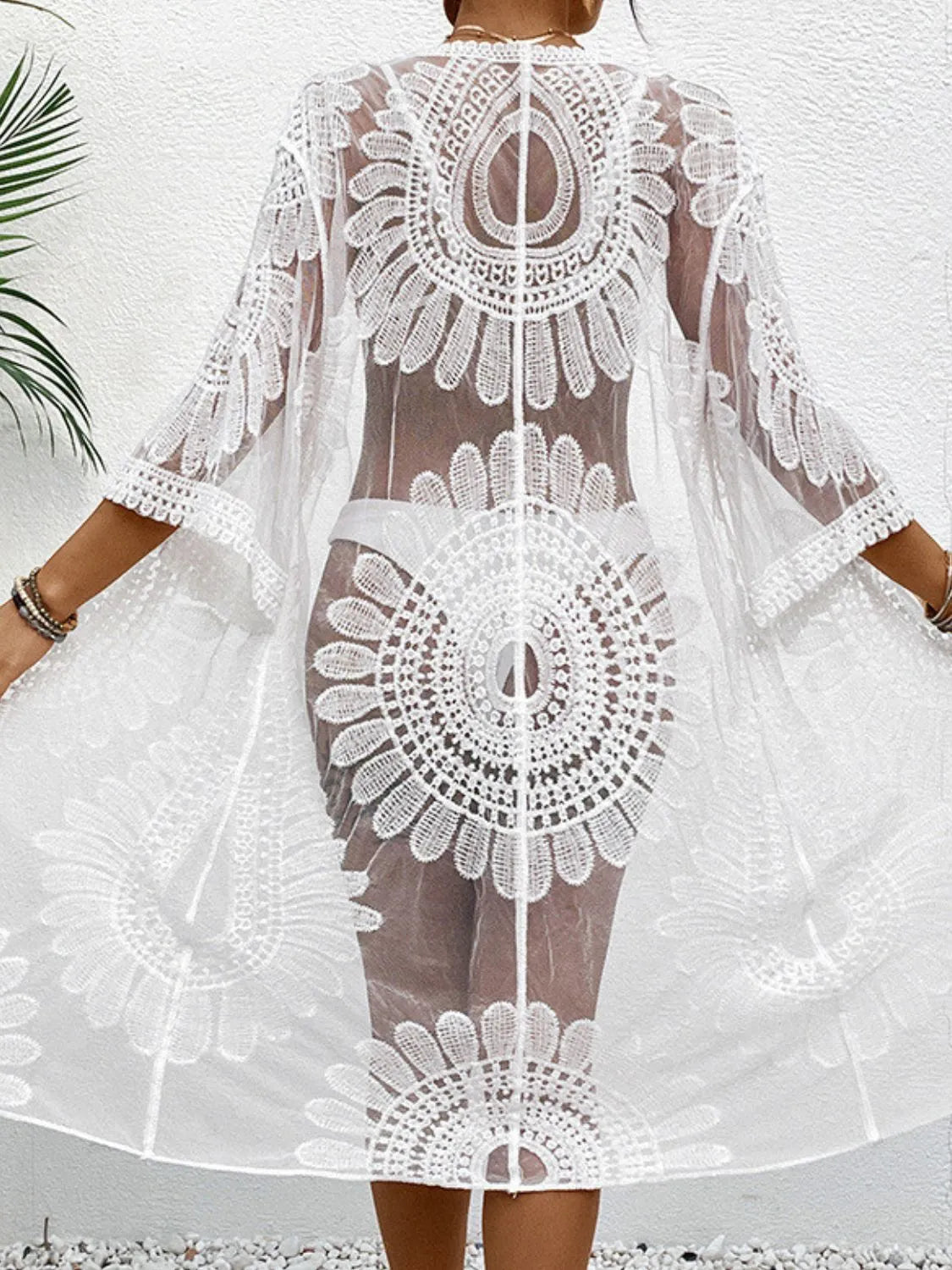 Back view of white lace cover-up