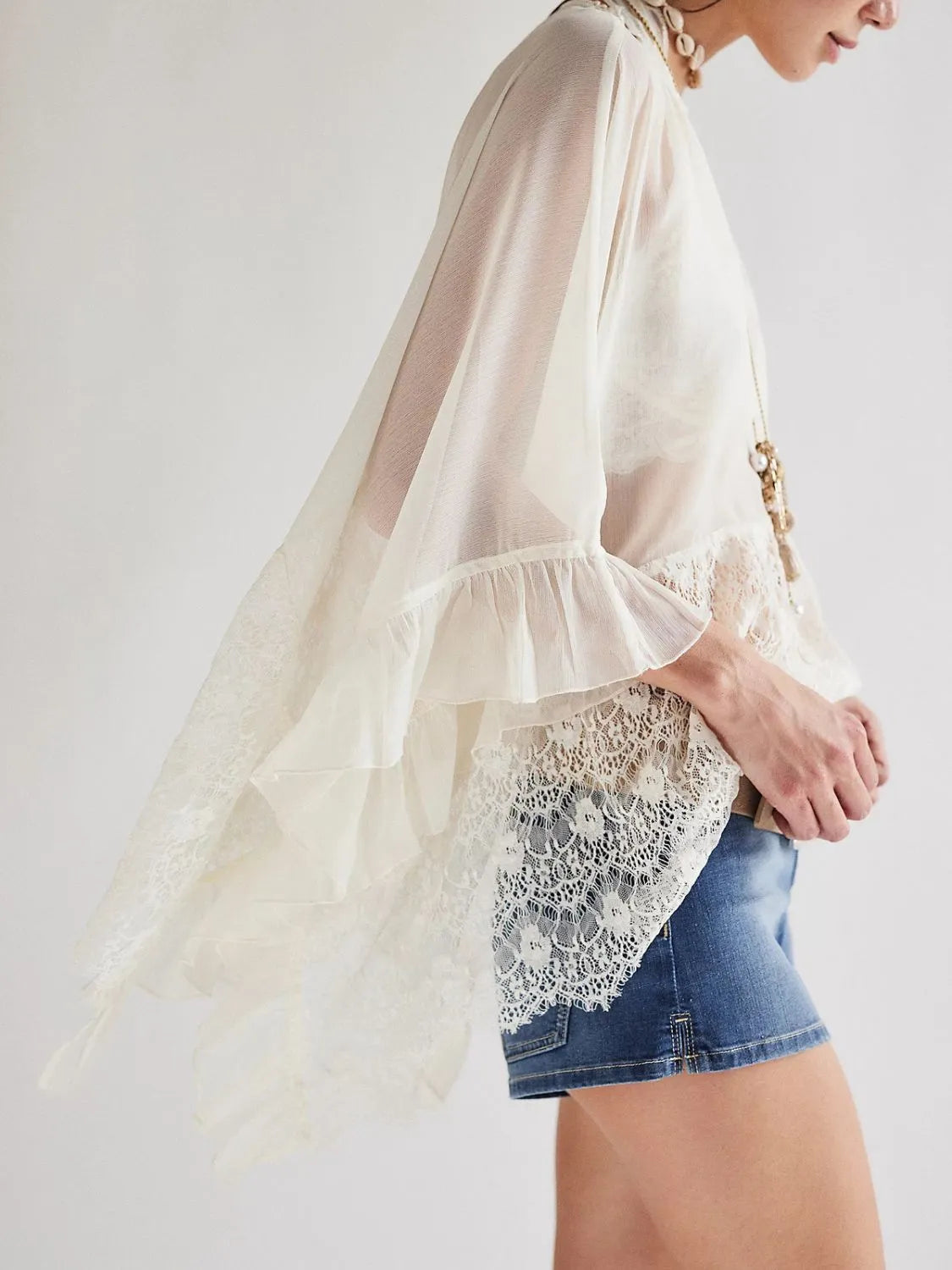 Front view white lace ruffle cover-up