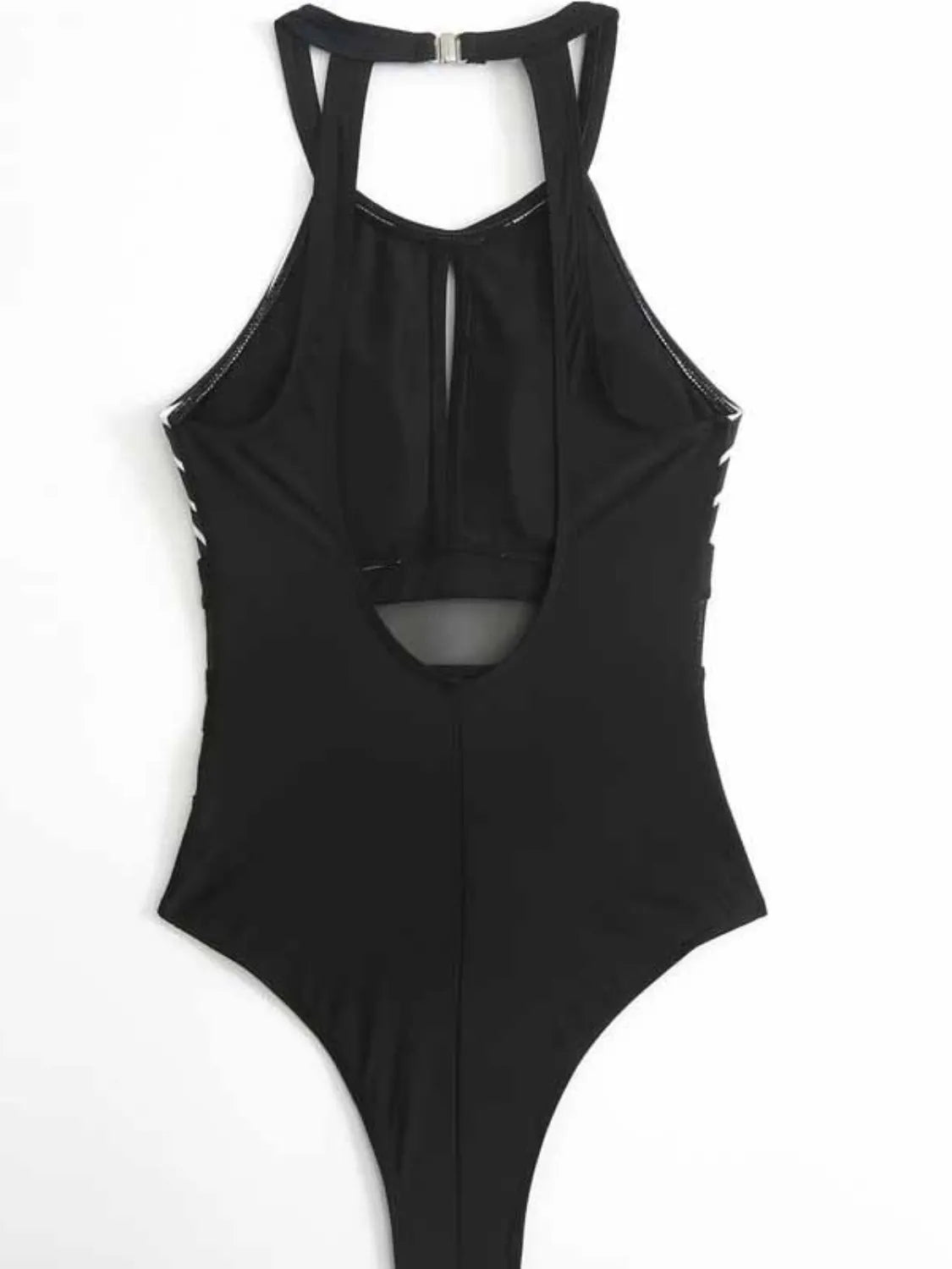 Back view of black backless one-piece swimsuit
