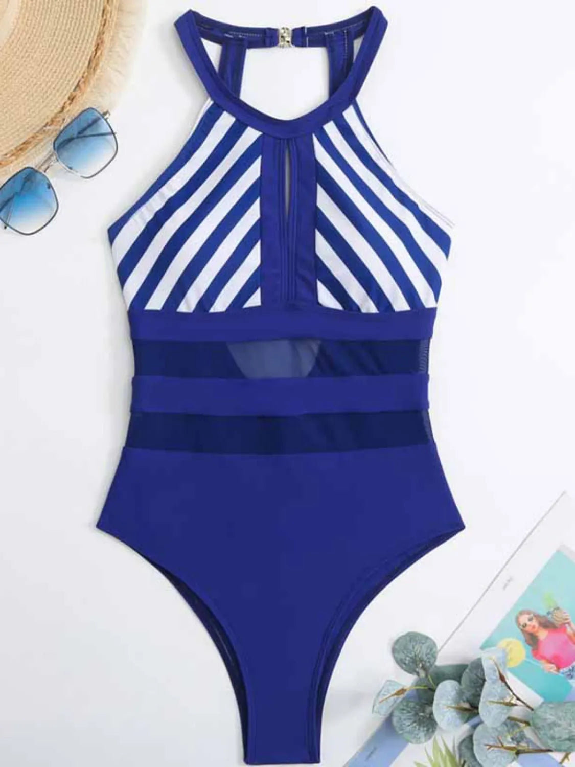Front-facing dark navy one-piece with backless style