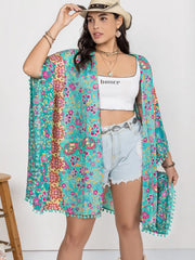 Front view plus turquoise cover-up with tassels