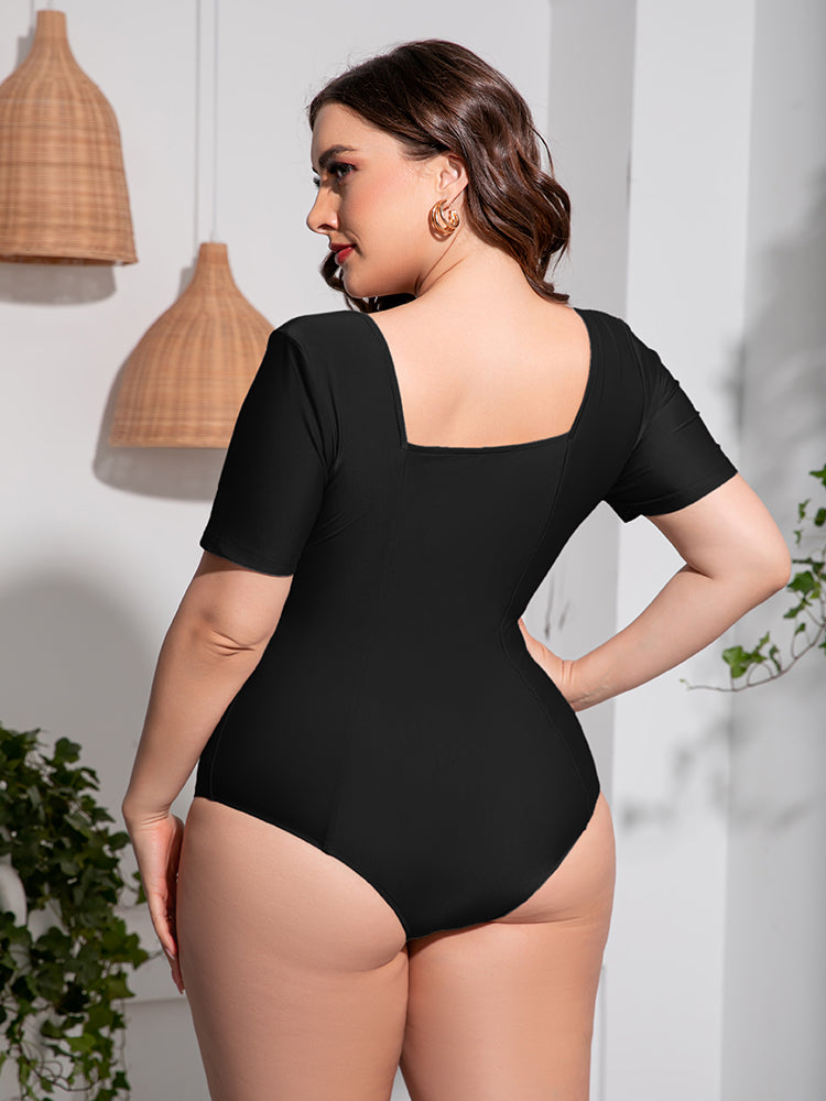 Back view of Plus Size Scoop Neck Short Sleeve One-Piece Swimsuit in black