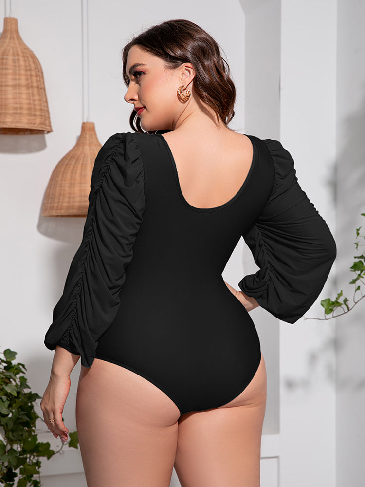 Back view of Plus Size Tied Deep V Balloon Sleeve One-Piece Swimsuit in black