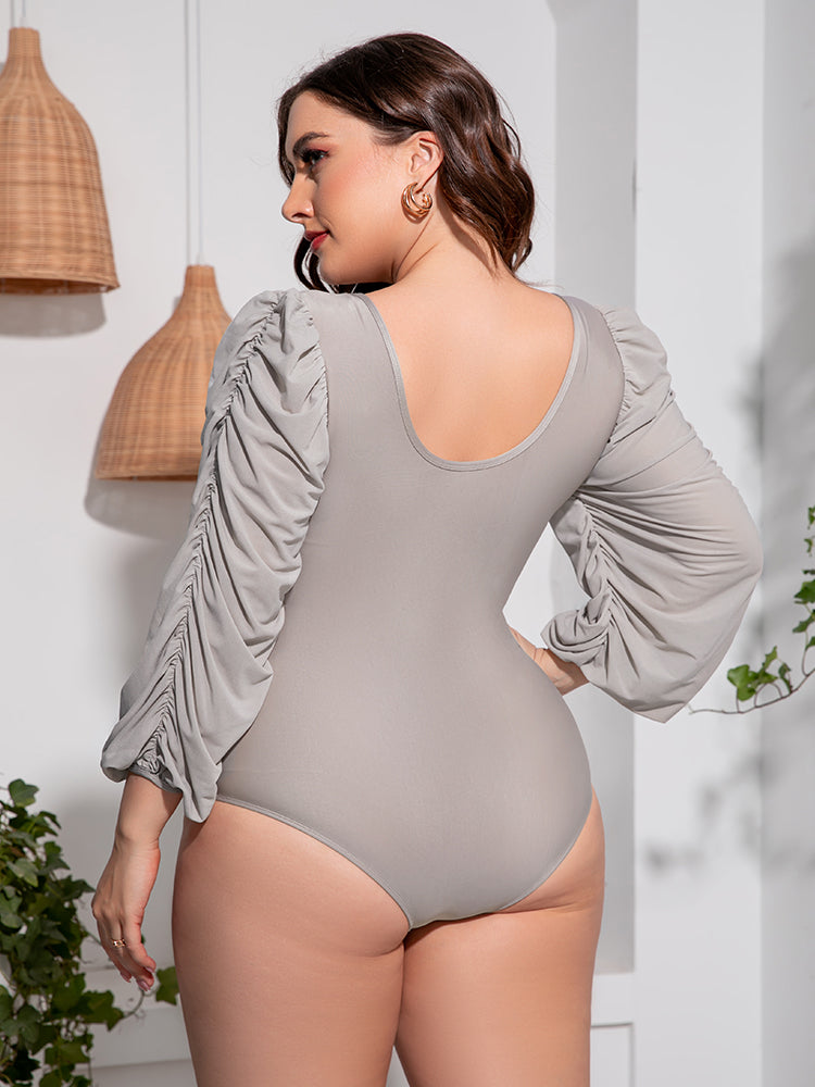 Back view of Plus Size Tied Deep V Balloon Sleeve One-Piece Swimsuit in light grey