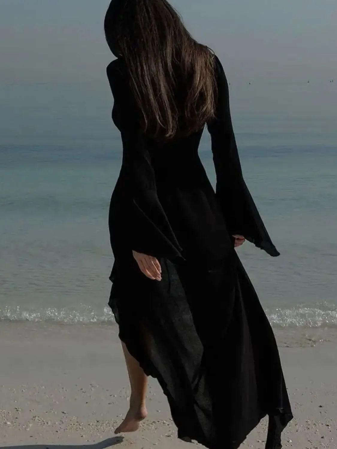 Black beach dress with tie and ruffles