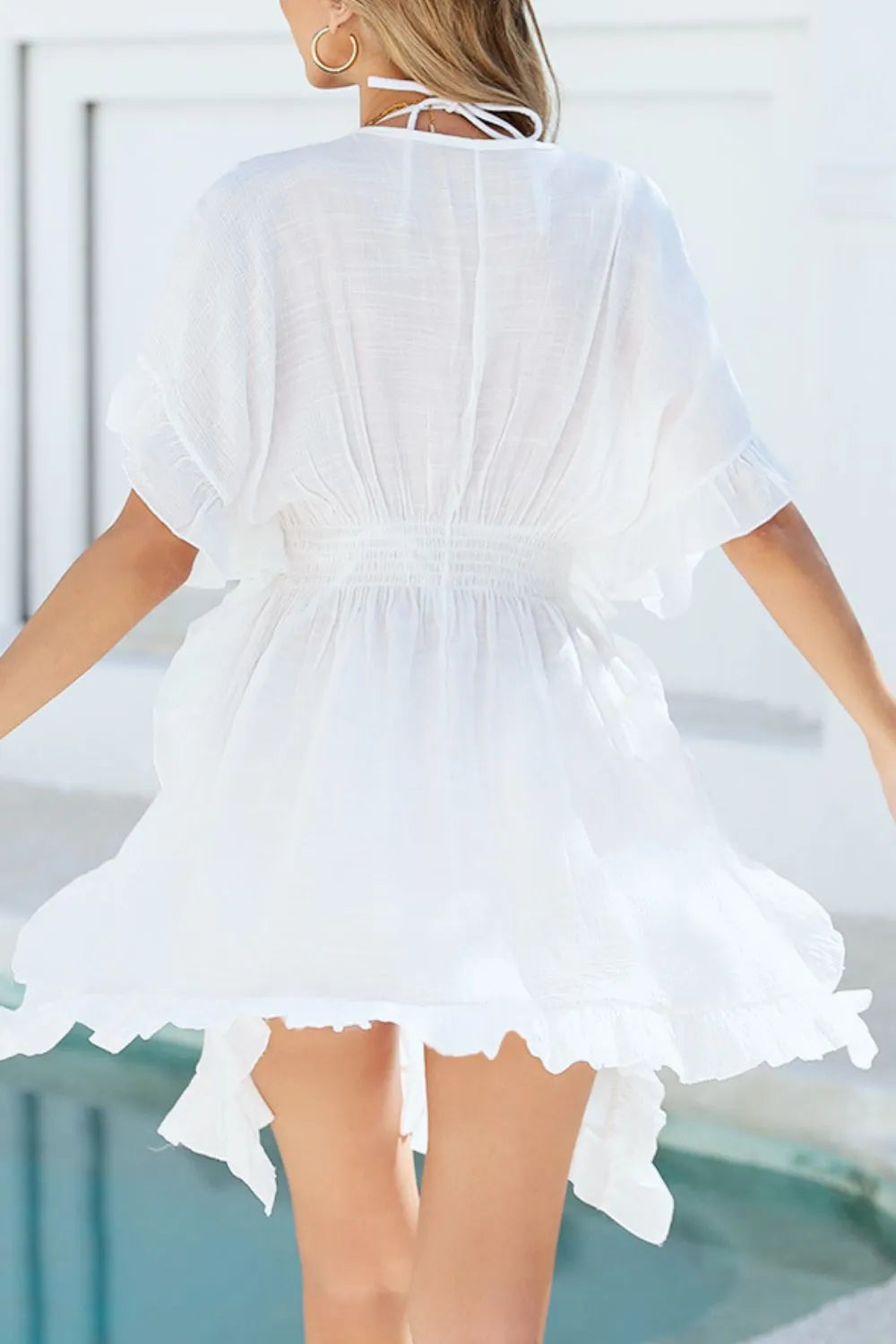 Rear view white ruffled swim cover