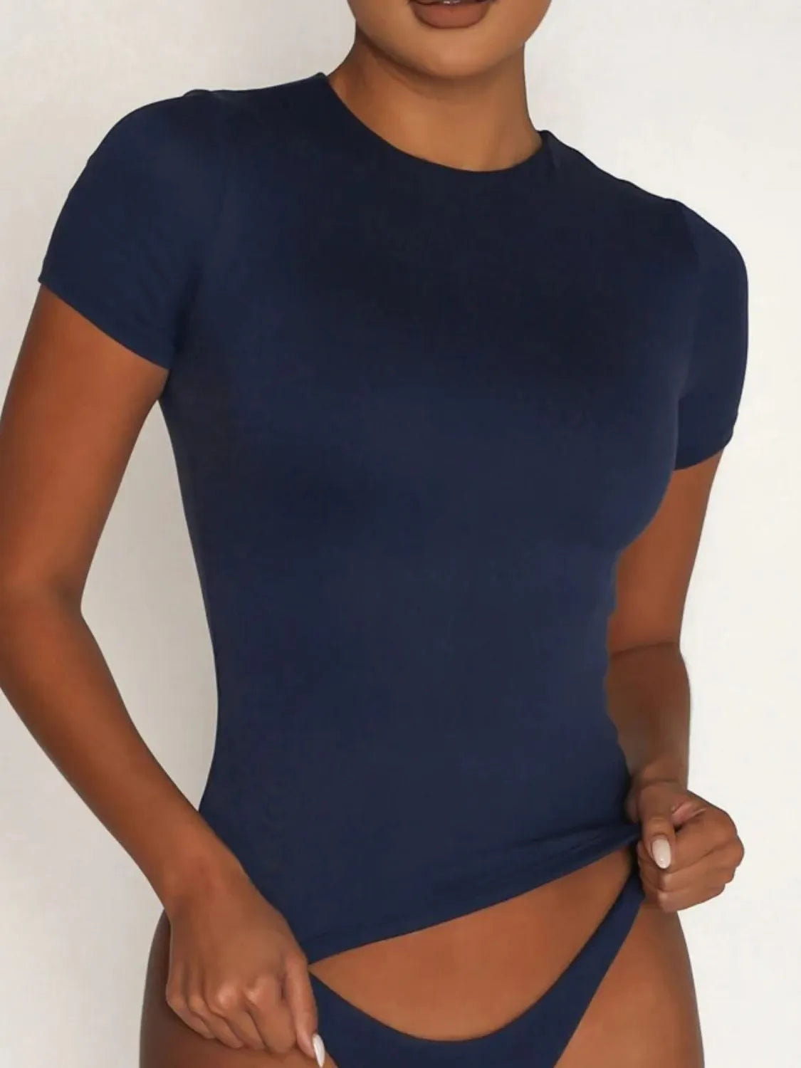 Dark blue short sleeve swim top front