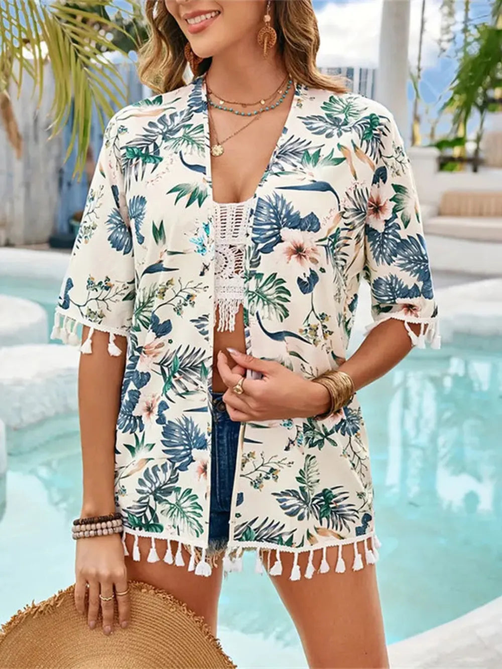 Front view of pastel yellow tassel printed open front half sleeve cover-up