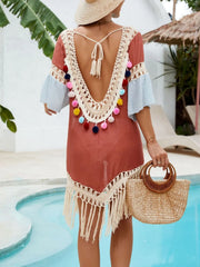 Tied back terracotta swimsuit cover-up with fringe