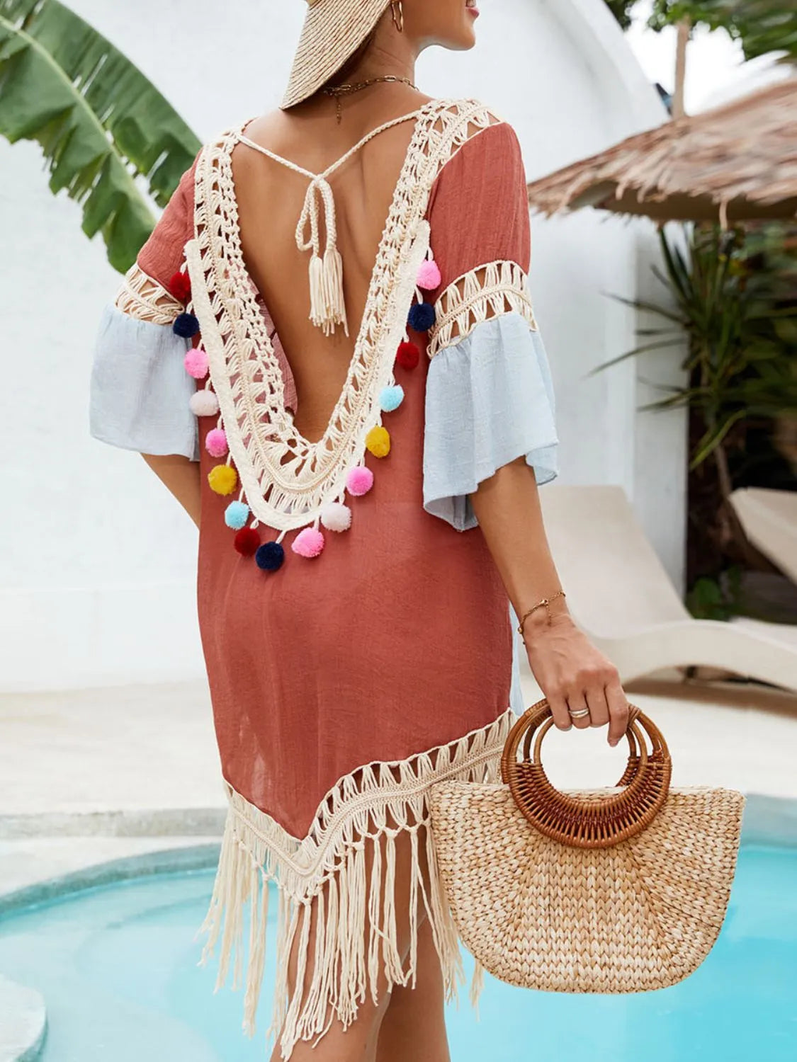 Rear view tassel hem V-neck beach dress in terracotta